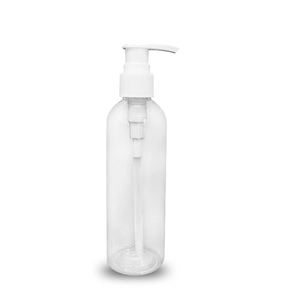 Clear PET pump bottle with white dispenser for travel lotion and cosmetics storage
