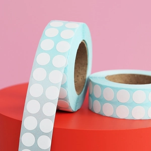 Macro shot of self-adhesive round white labels for DIY diamond painting organization