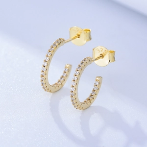Detailed close-up of S925 hallmark on gold plated sterling silver hoop earrings