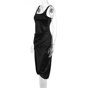 Detailed side view of black midi dress featuring elegant ruching and side slit detail