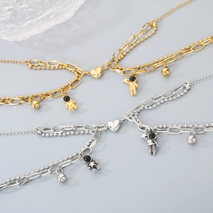 Minimalist astronaut heart magnetic couples bracelets in gold and silver steel chain