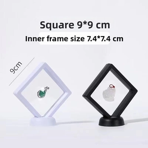 Detailed view of 9x9cm black and white PE film jewelry boxes with base and inner dimensions