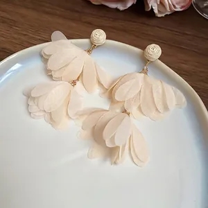 Elegant cream chiffon flower tassel earrings with woven beads and bohemian style