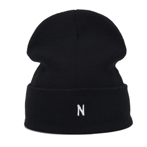Classic black knitted beanie with white N letter embroidery and stylish folded cuff