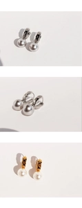Detail of quilted silver and gold hoop earrings with grey and white pearls