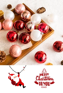 Christmas tree ornaments in red and gold finish on vintage book pages backdrop