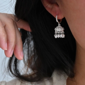 Elegant silver Jhumka bell earrings with sparkling zircon and hanging white pearls