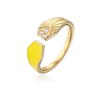 Detail of gold-plated open ring with yellow enamel and three sparkling zircons