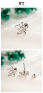 Macro detail of snowflake stud earring with pavé zircon and secure screw-back closure
