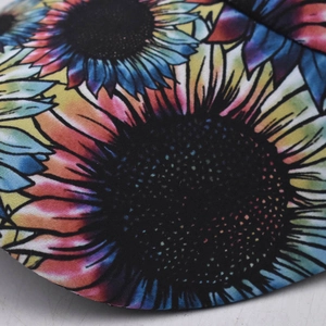 Floral ponytail baseball cap with colorful sunflower print and mesh back opening