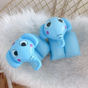 Detail showing blue inflatable swim arm bands with cartoon elephant design for kids