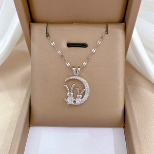 Silver titanium steel moon and twin rabbit pendant necklace with sparkling cubic zirconia