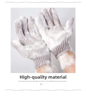 Exfoliating bath glove in light purple fabric creating rich foam for skin cleansing
