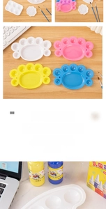 Macro shot of cat paw and flower shaped plastic paint palettes in assorted pastel colors