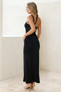Detail of back cross straps and mesh splicing on a slim black bodycon dress