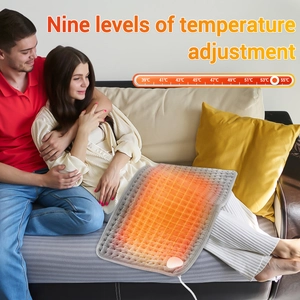 Close-up of a cozy grey heated blanket pad showing 9-level digital temperature control display