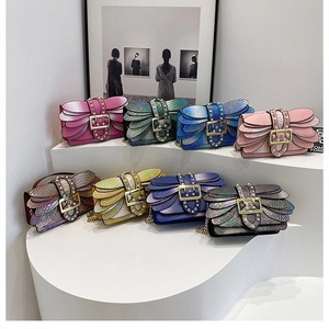 Collection of gradient snakeskin handbags with wing patterns and pearl details