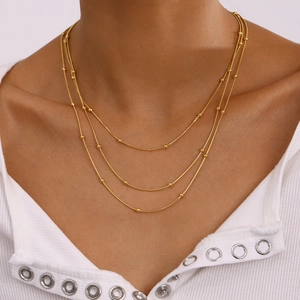 Three-layer 18k gold-plated beaded snake chain necklace for women featuring layered styling