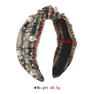 Detail view of pearl and rhinestone plaid headband showing 65.5g weight and 6cm width