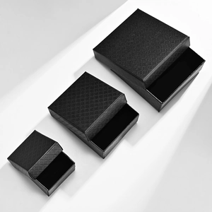 Set of three black rhombus textured jewelry gift boxes for rings and necklaces