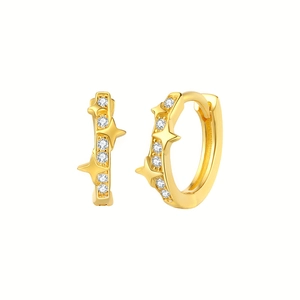 Elegant gold star hoop earrings with sparkling zircon crystals in minimalist jewelry style