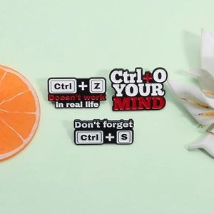 Creative computer keyboard enamel pins featuring Ctrl+Z, Ctrl+O, and Ctrl+S shortcut designs