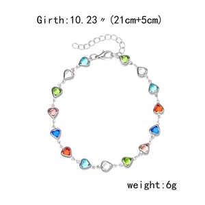 Detail of colorful heart charm bracelet showing 21cm+5cm extension chain length and size