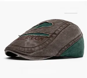 Detail of vintage washed coffee and green patch flat cap with Boston embroidery