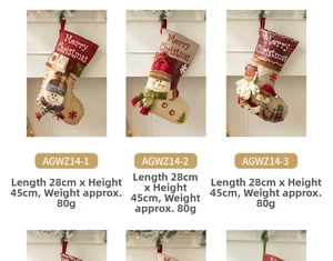 Detail of Christmas stocking with 3D applique Santa and snowman on fireplace