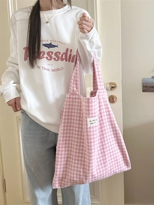 Pink gingham tote bag with shoulder straps and a colorful letter patch for women