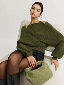 Olive green knit two-piece sweater with cross neckline and textured chunky knit style