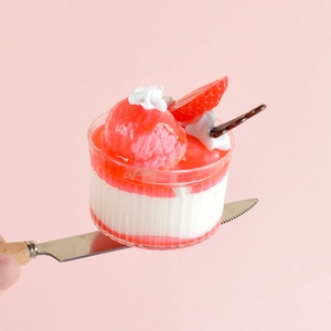 Realistic strawberry cream sundae model with pink layers and ice cream scoop topping