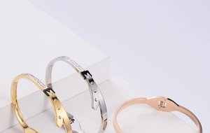 Three-color polished stainless steel bracelets with rhinestone buckle detail