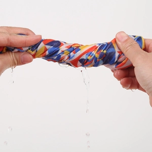 Colorful patterned sports bandana showing quick-dry water absorption and drainage performance