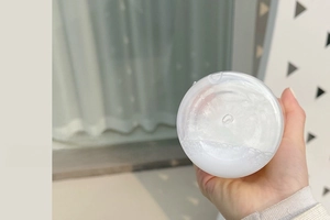 Detailed view showing the smooth rounded base design of the transparent plastic water bottle