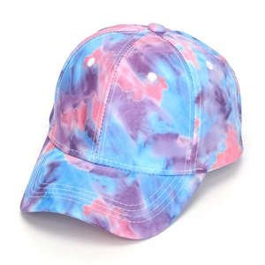 Close-up of pink and blue tie-dye baseball cap stitching and cotton canvas texture