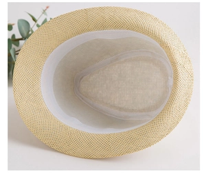Interno dettagliato del cappello di paglia con fascia antisudore e trama naturale traspirante
