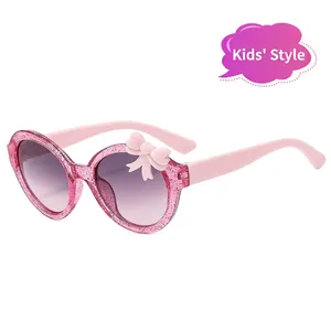 Pink glittery bow kids sunglasses with purple gradient lenses for sun protection