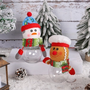 Christmas snowman and gingerbread man candy jars with clear bowls and festive knit hats