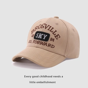 Detailed close-up of embroidered BROSVILLE and SKY text on children cotton baseball cap