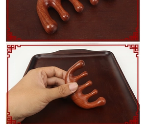 Detailed macro view of a five-tooth red sandalwood scalp massage comb with natural grain