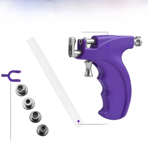Professional purple ear piercing gun kit with stainless steel studs and marker pen