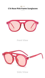 Detail view of pink round aviator sunglasses with stylish double bridge and metal hinges