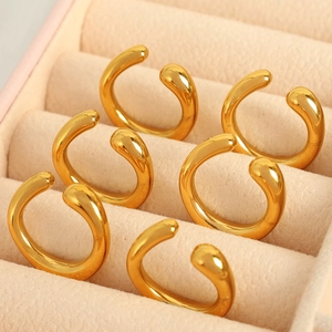 18k gold plated stainless steel C-shaped ear cuffs set displayed in a beige jewelry box