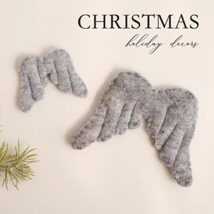 Grey wool felt angel wings Christmas ornaments with decorative frosted pine branch