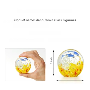 Macro detail showing hand blown glass ball dimensions of 2.28x2.31 inches with fish inside