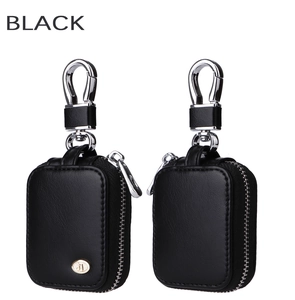 Detail view of premium black leather protective cases with musical logo and silver swivel clips