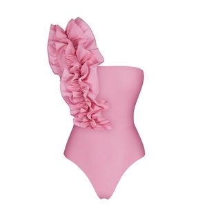 Detailed view of pink one-shoulder swimsuit featuring layered ruffle trim on the strap