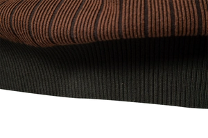 Macro shot of high-quality rib knit texture on men's striped sweater in brown and black
