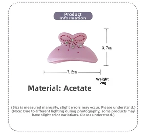 Detailed view of pink acetate bow hair claw clip with dimensions and rhinestones
